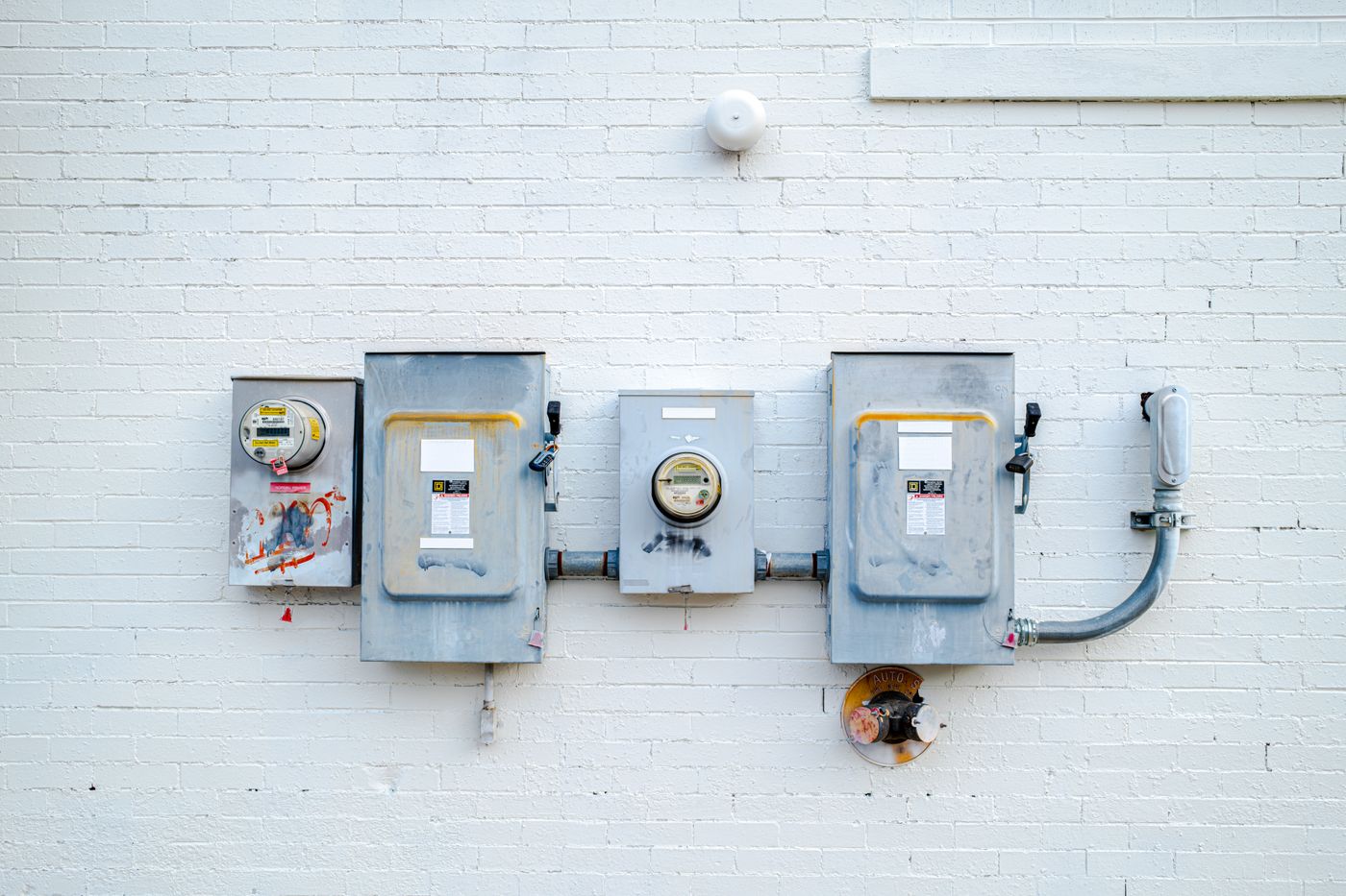 Exterior service meters on brick