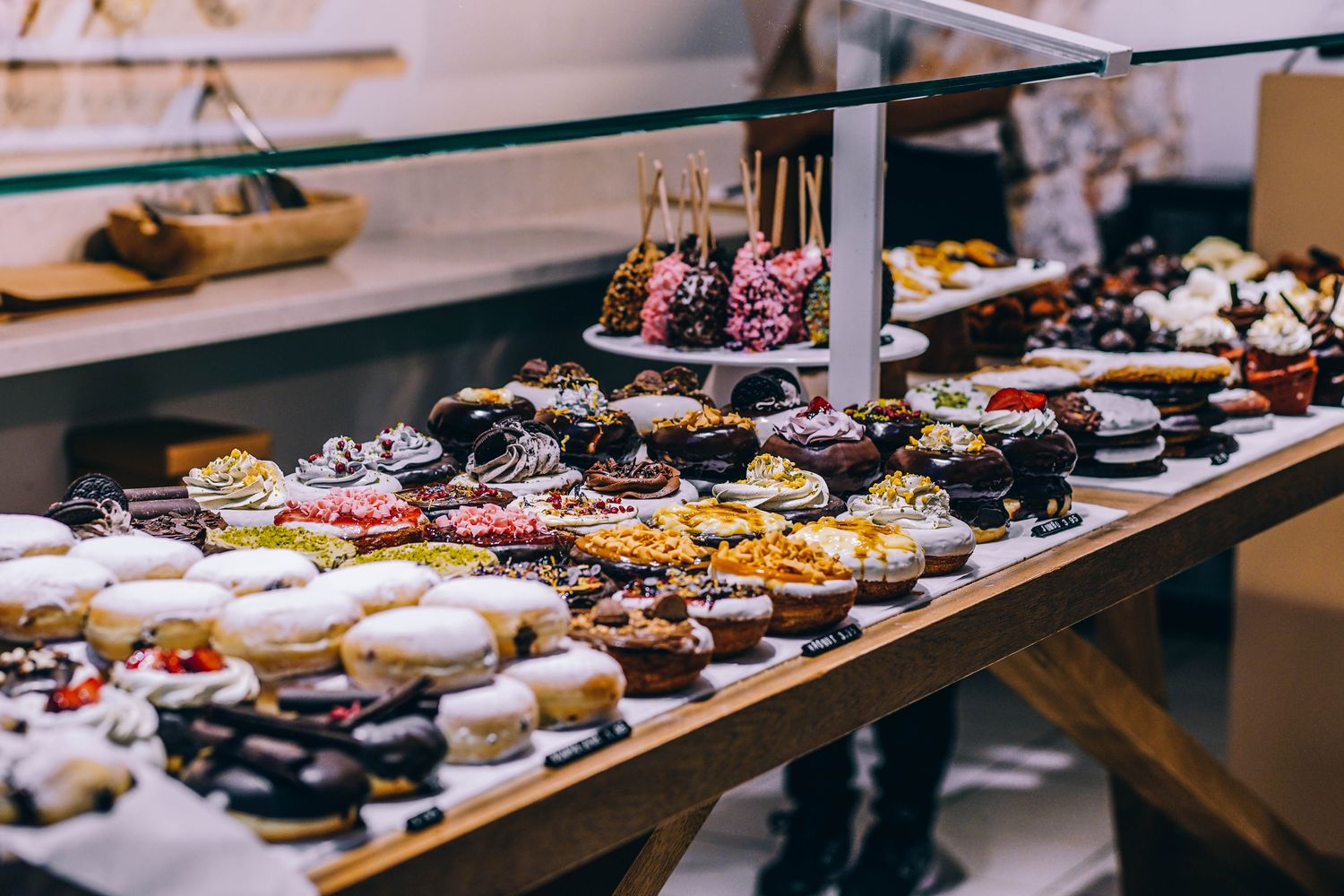 A glass pastry display case