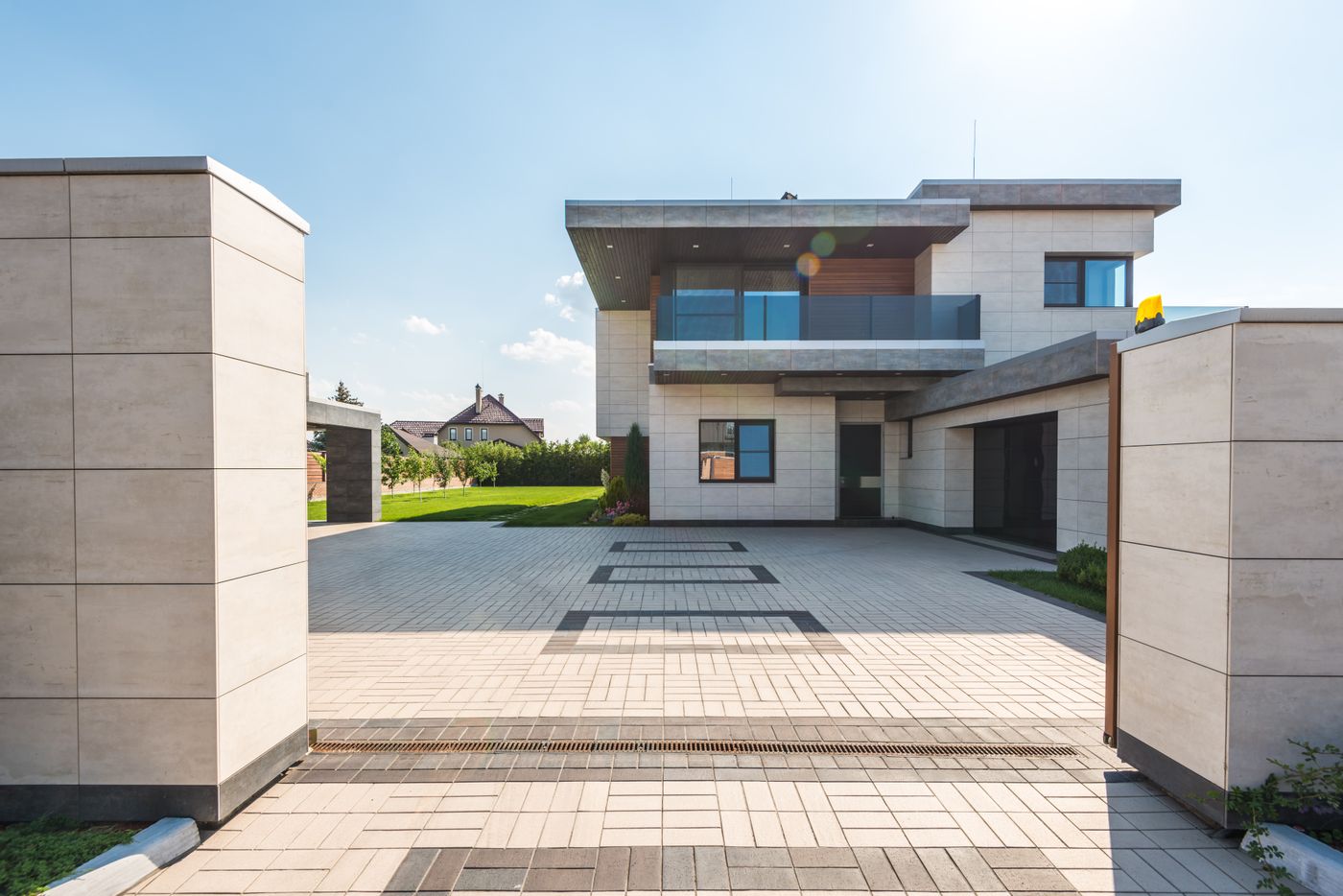 Home exterior with clean roof and driveway