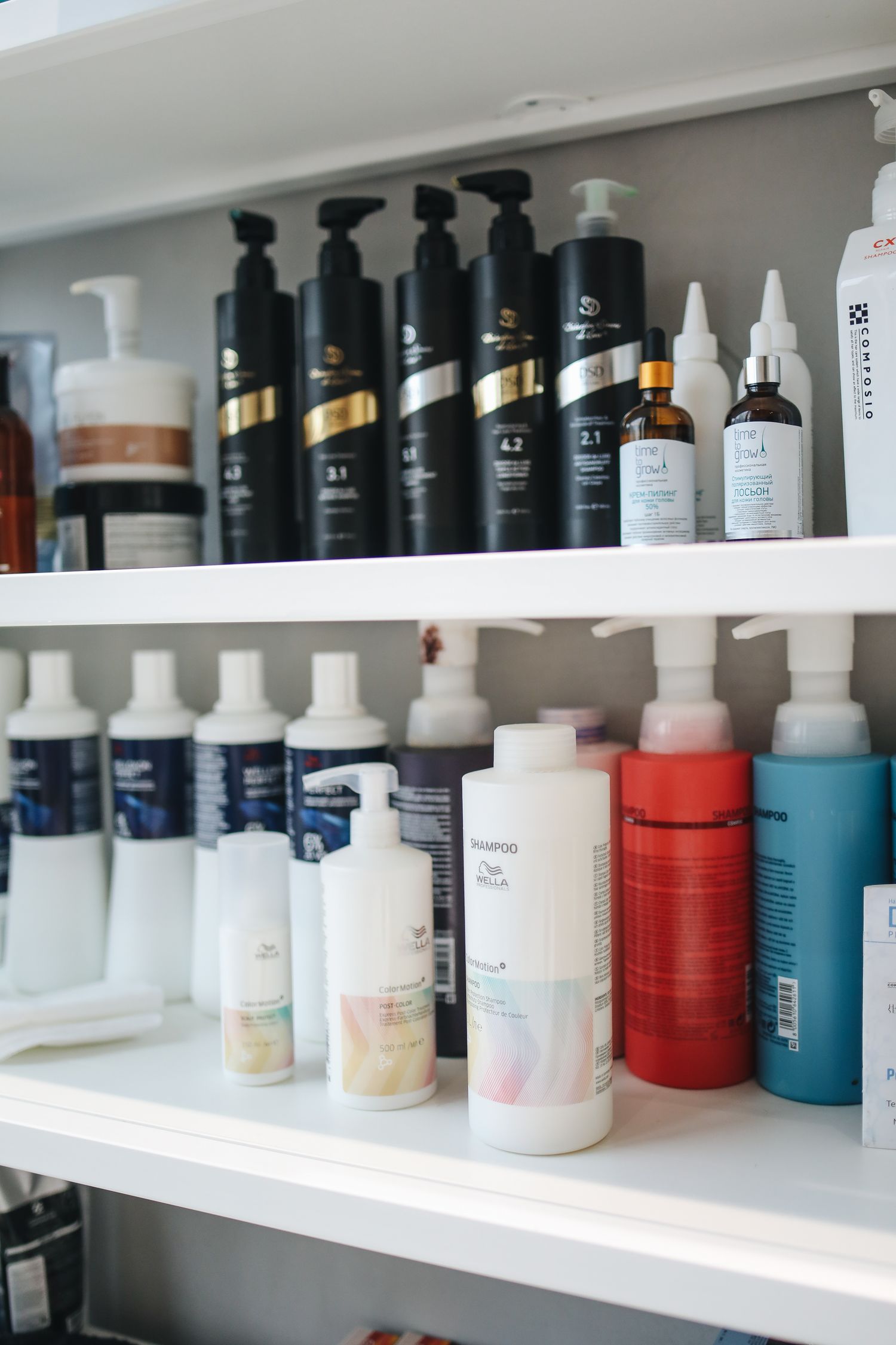 Shelf of skincare product bottles
