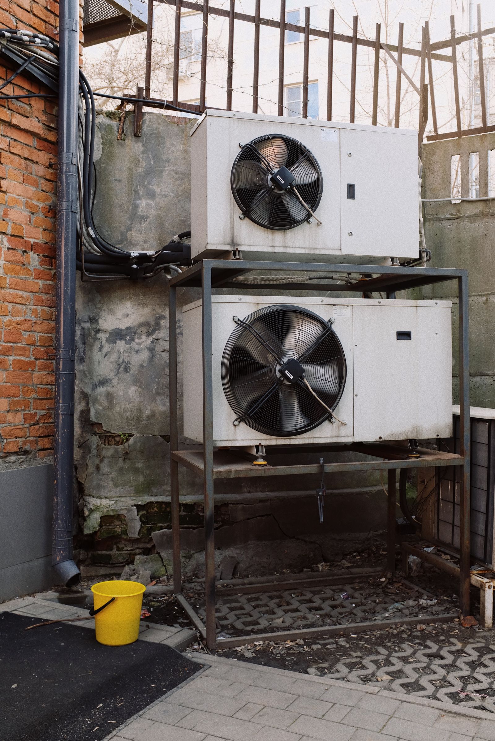 Outdoor condenser units on a steel stand