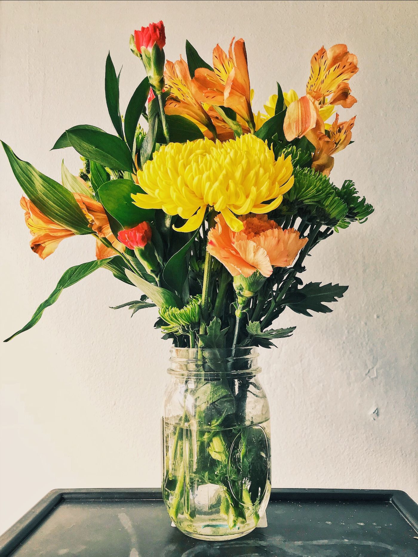 Mixed seasonal bouquet in a vase