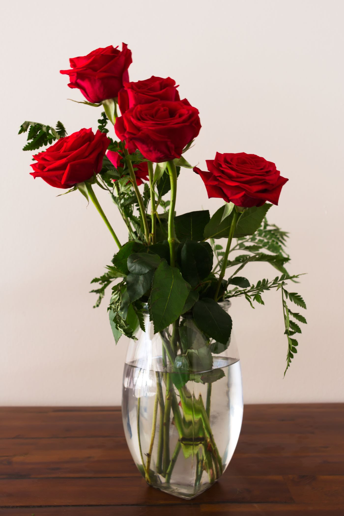 Red roses in a glass vase