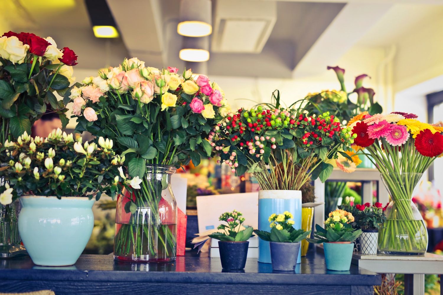Inside GG Flowers — blooms on the counter