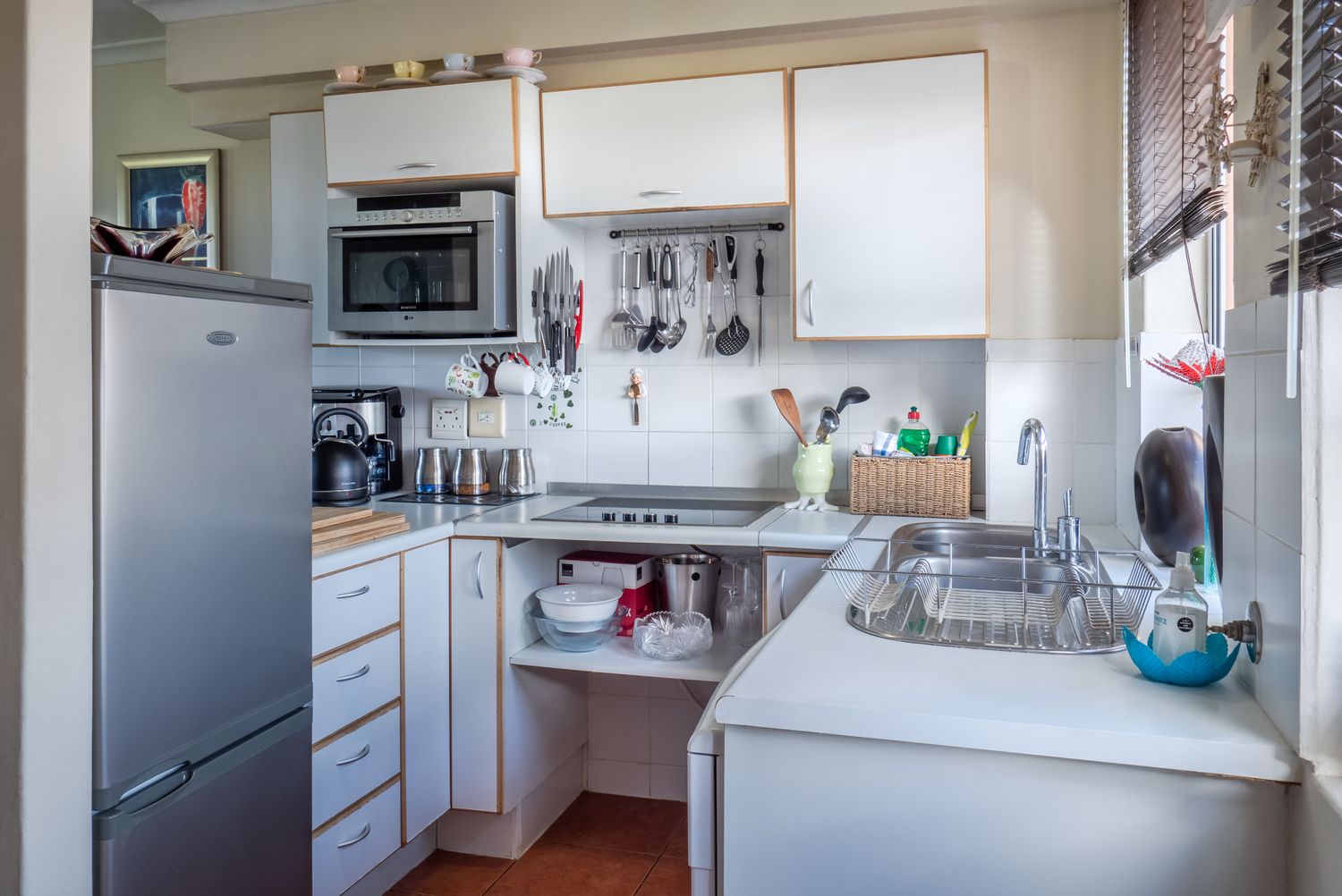 Renovated white kitchen with island
