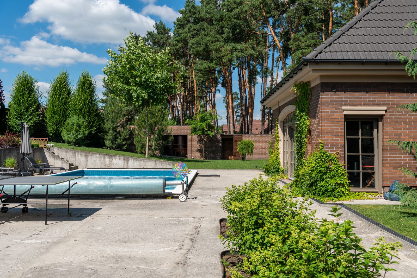 Covered backyard pool ready for season close