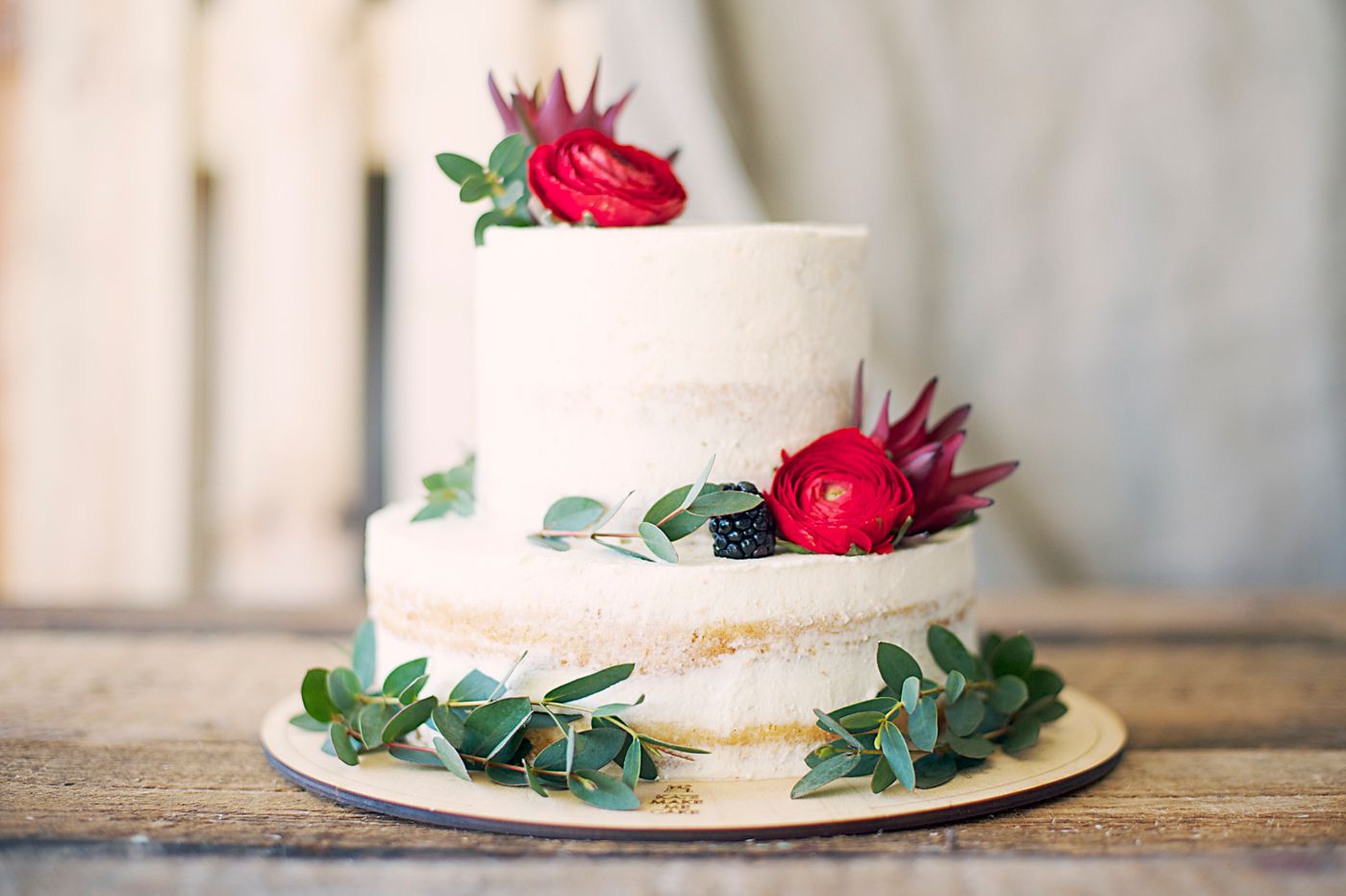 Gluten-free layer cake topped with fresh fruit