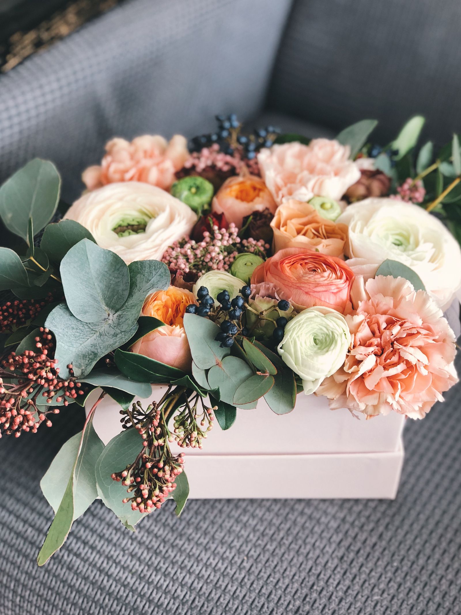 A built seasonal box arrangement