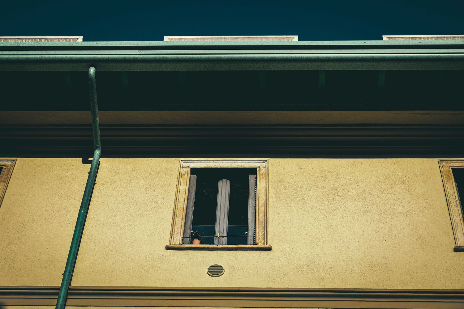 Eavestrough and gutter line along a building edge