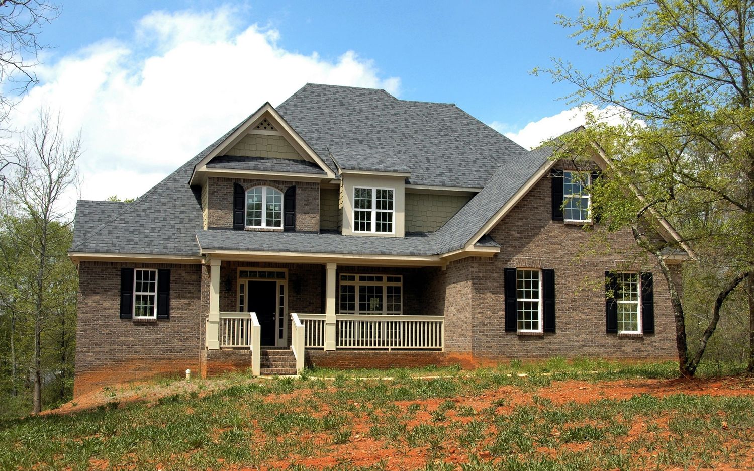 Clean home exterior with seamless gutter line