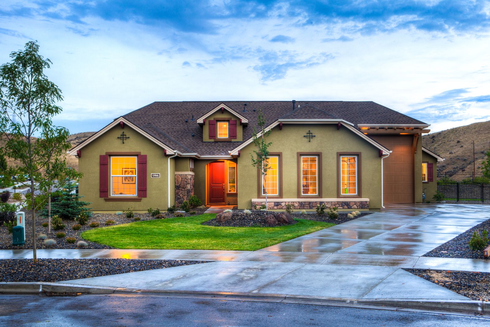 Two-storey home with finished gutters and roofline