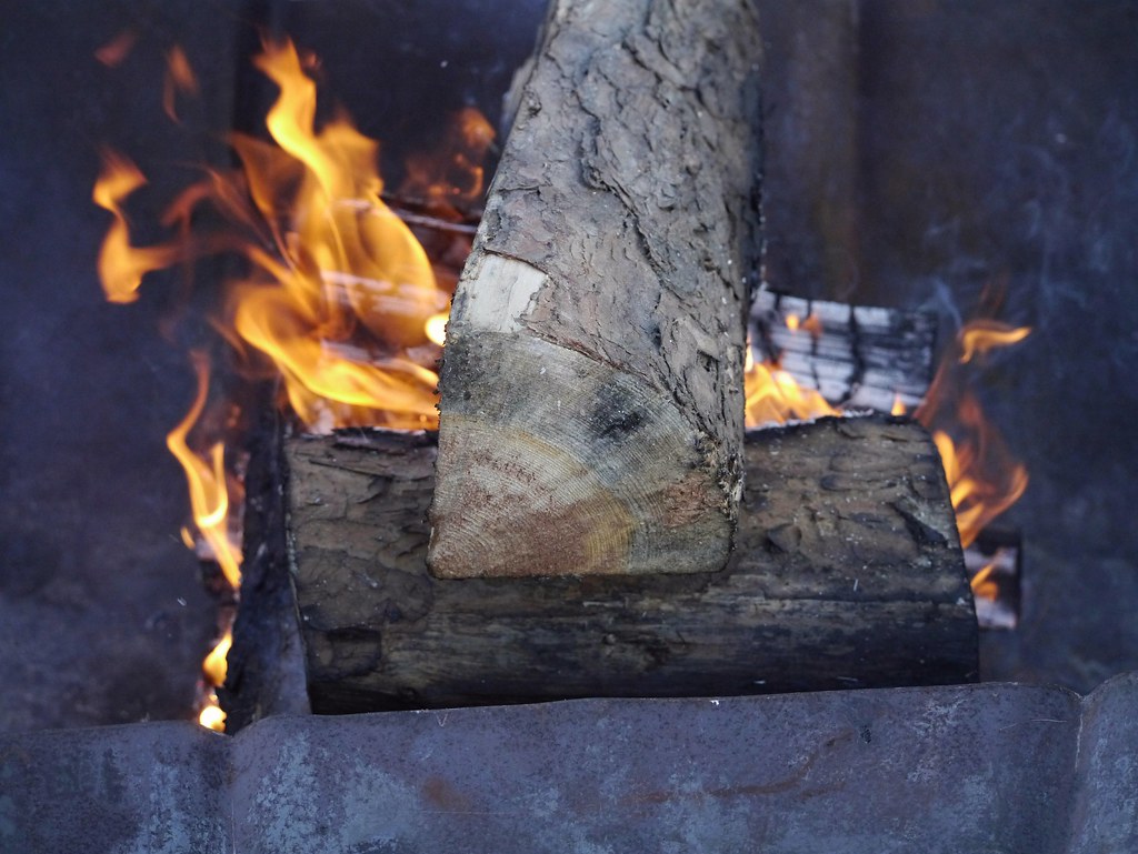 Burning logs and flame in a firebox