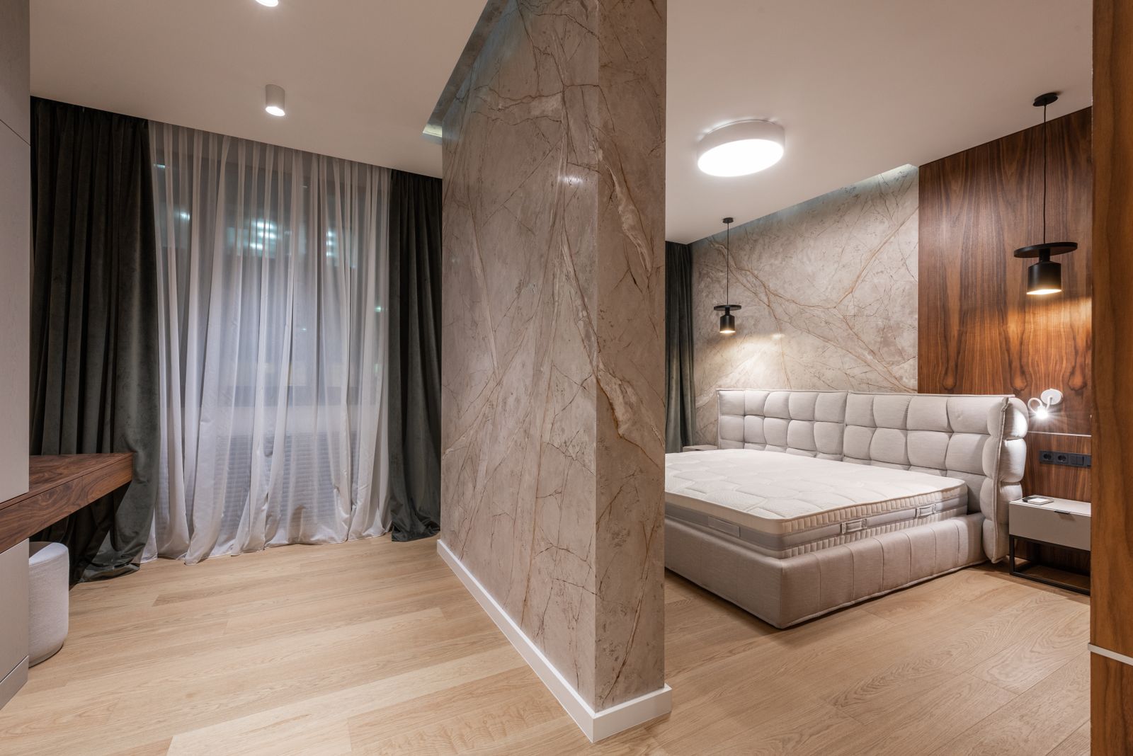 A freshly painted, light-filled bedroom with crisp white walls