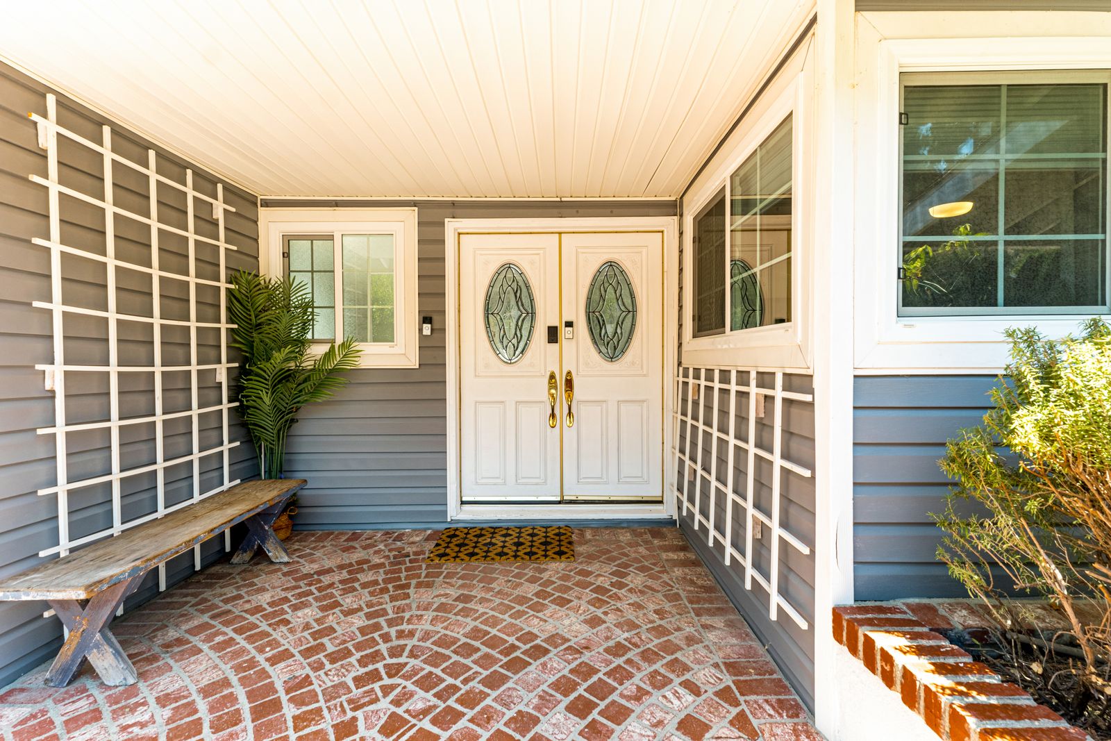 A double-door entry secured with new deadbolts