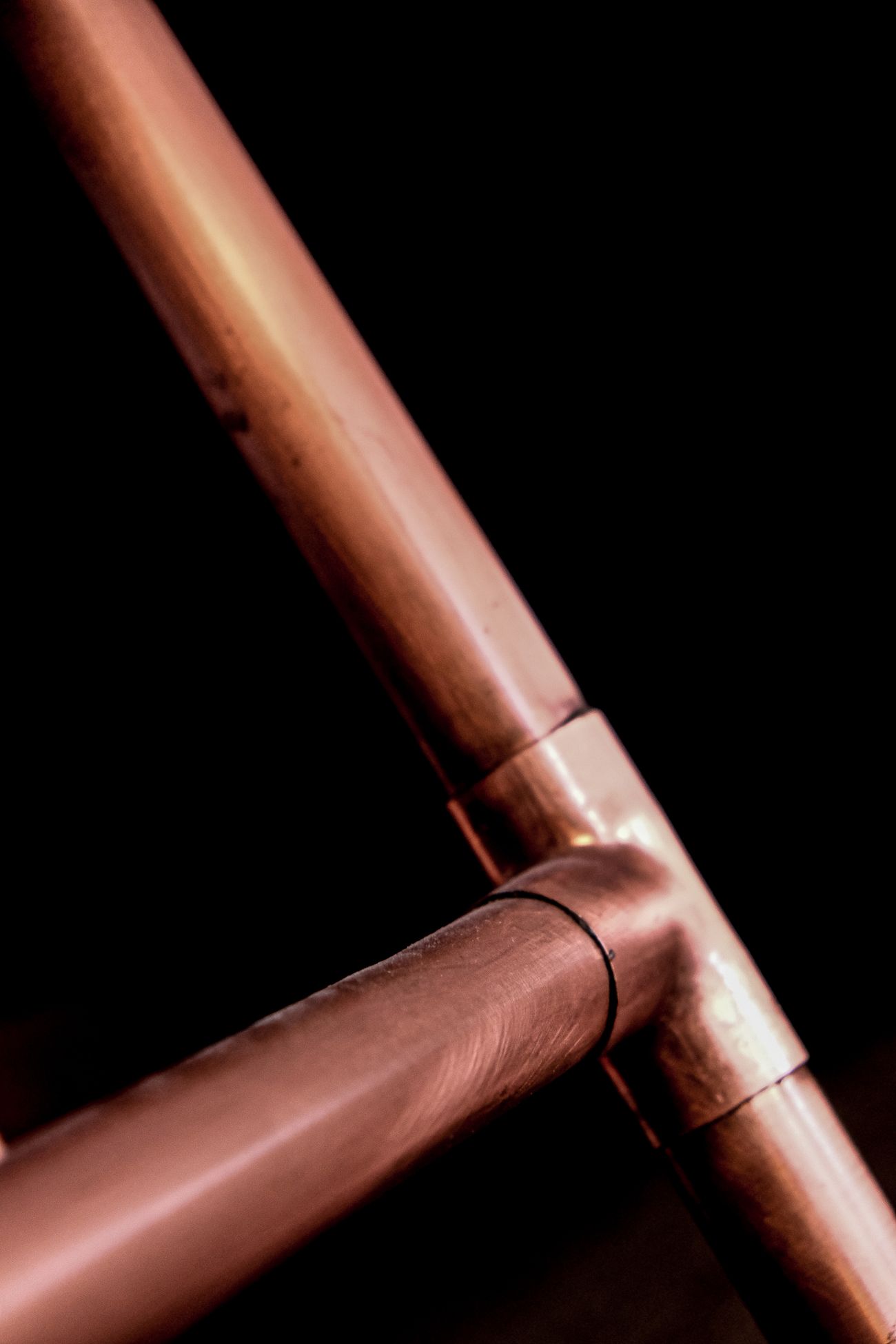 Polished copper pipe detail